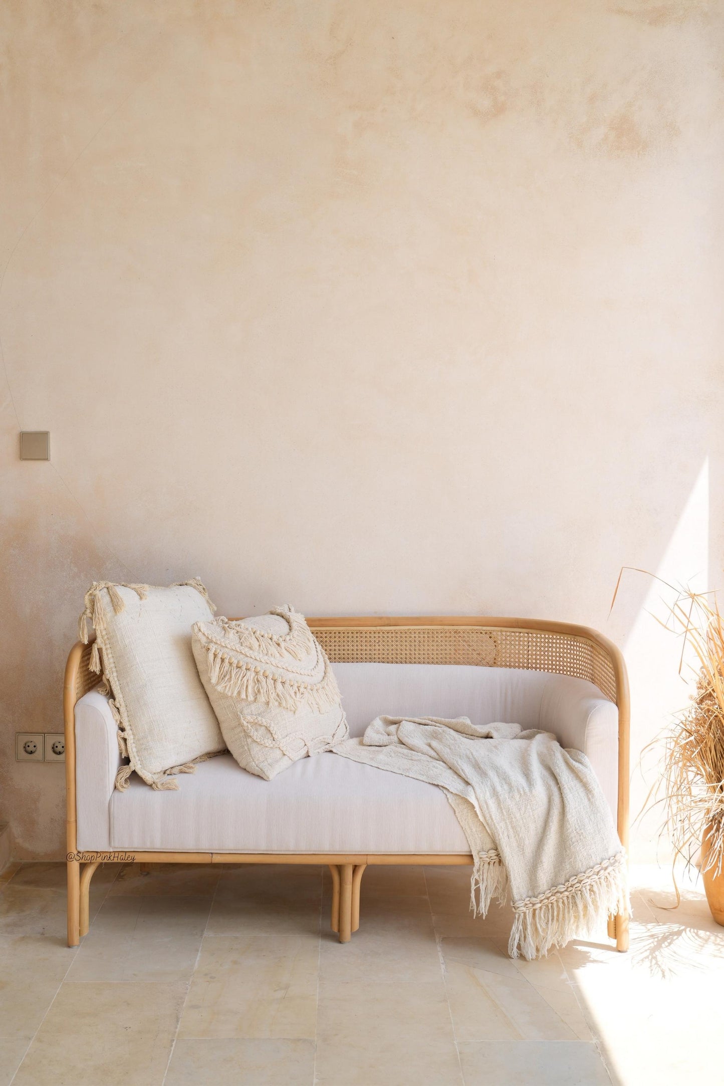 The Paramount Rattan Cane Sofa