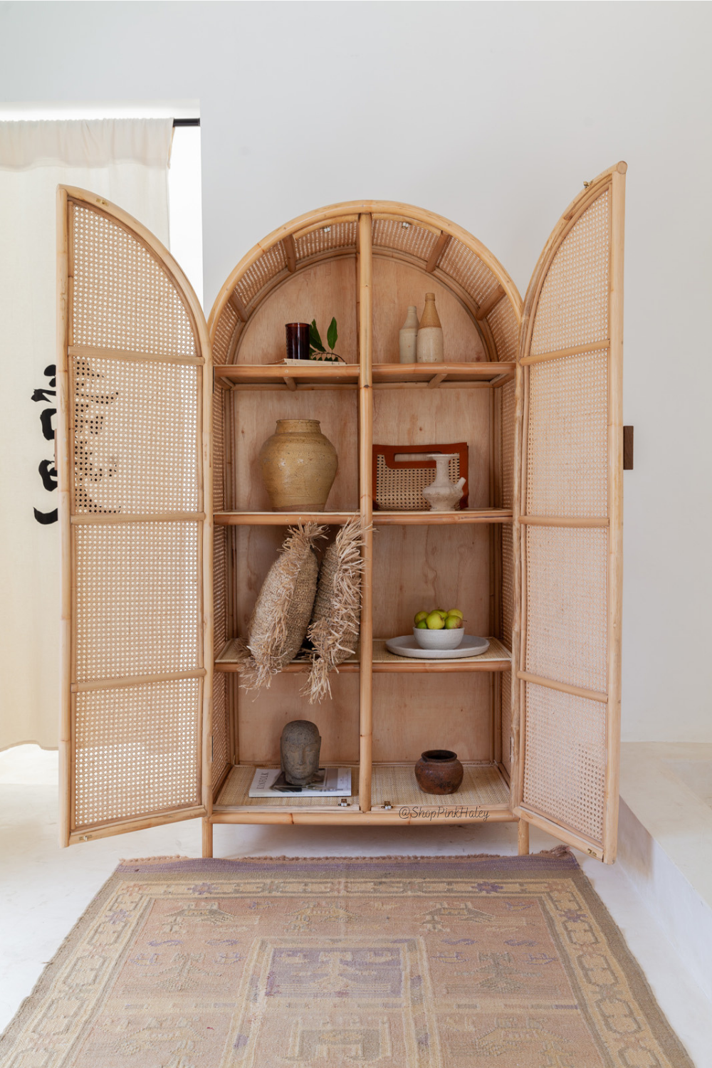 Arch rattan deals cabinet