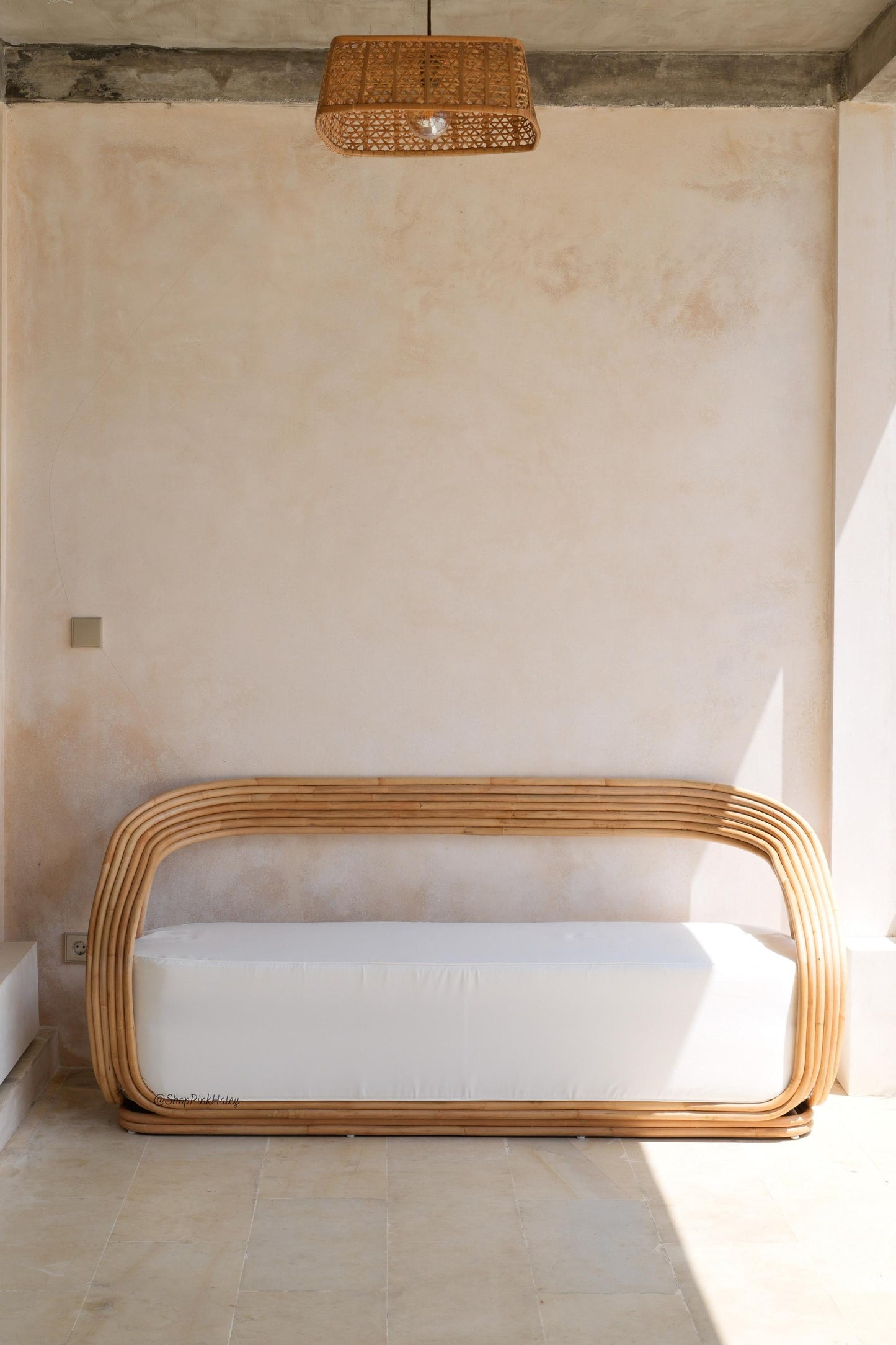 The Wavy Rattan Sofa